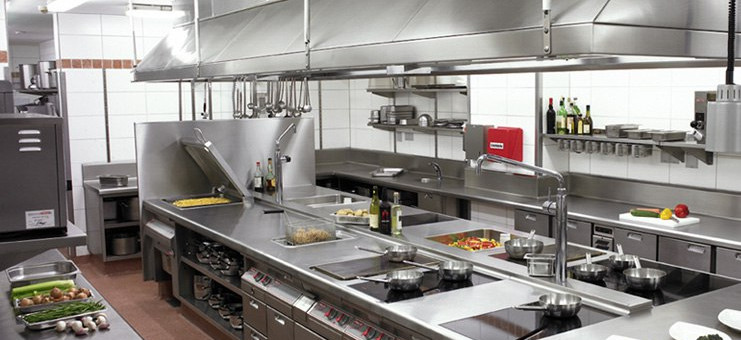 stainless commercial kitchen with exhaust